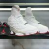 JORDAN RETRO 13 BLANCO Y GRIS UNISEX